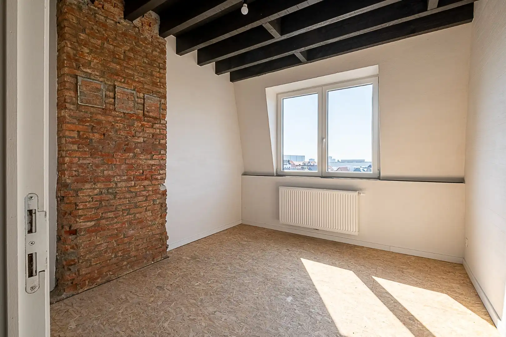 Genieten op hoogte: lichtrijk dakappartement met terras foto 9