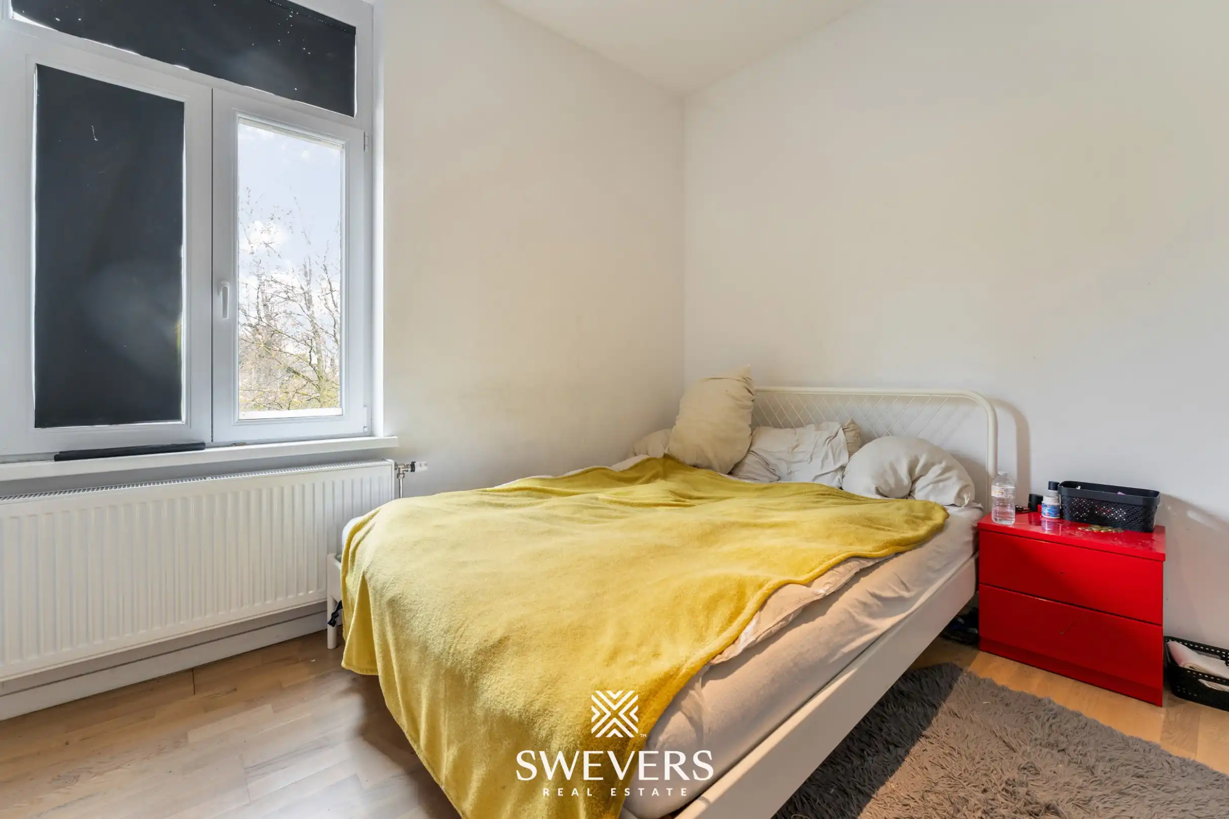 Instapklare stadswoning met zonnige tuin op toplocatie nabij centrum Leuven foto 11