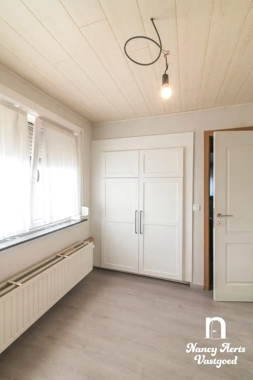 Gerenoveerde instapklare woning met zuidgerichte tuin foto 24