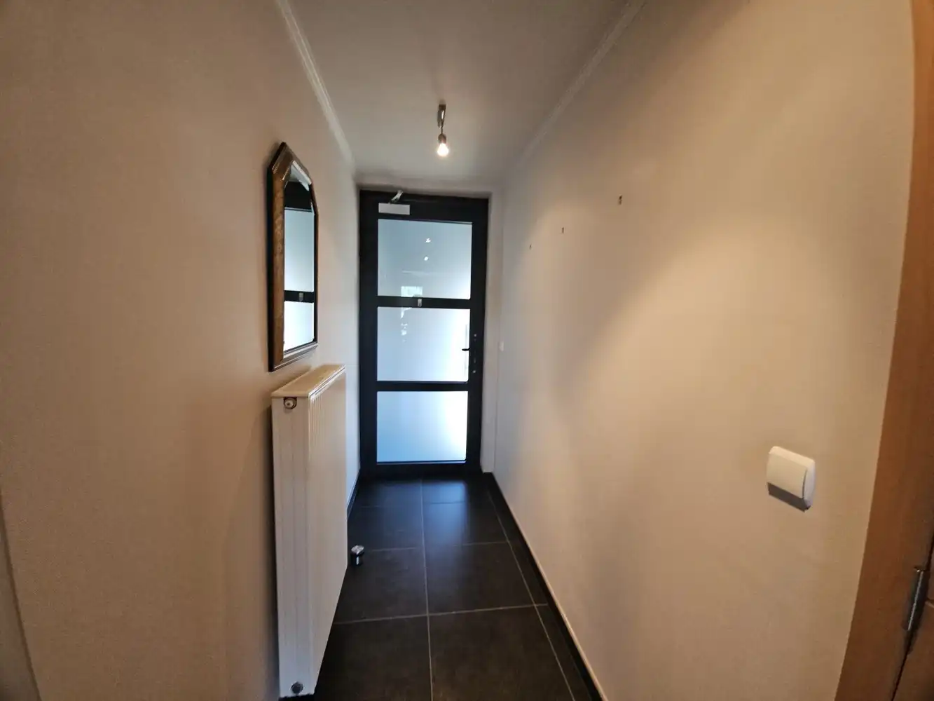 Zeer ruim appartement met terras + garage foto 16