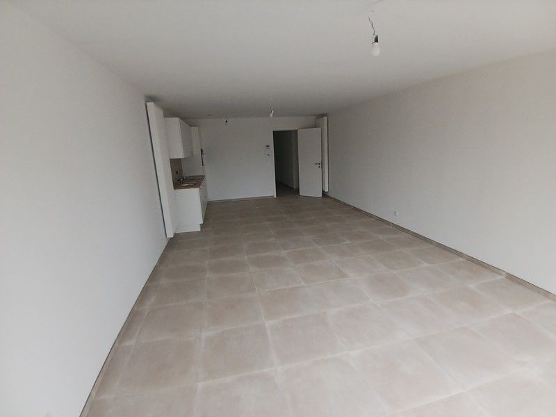 Gelijkvloers nieuwbouw appartement met terras en tuin gelegen in het centrum van Opglabbeek foto 9