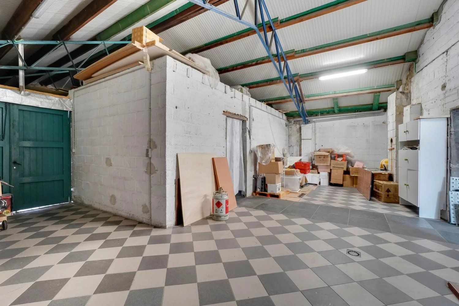 Halfopen bebouwing met 3 slaapkamers en handelspand foto 22