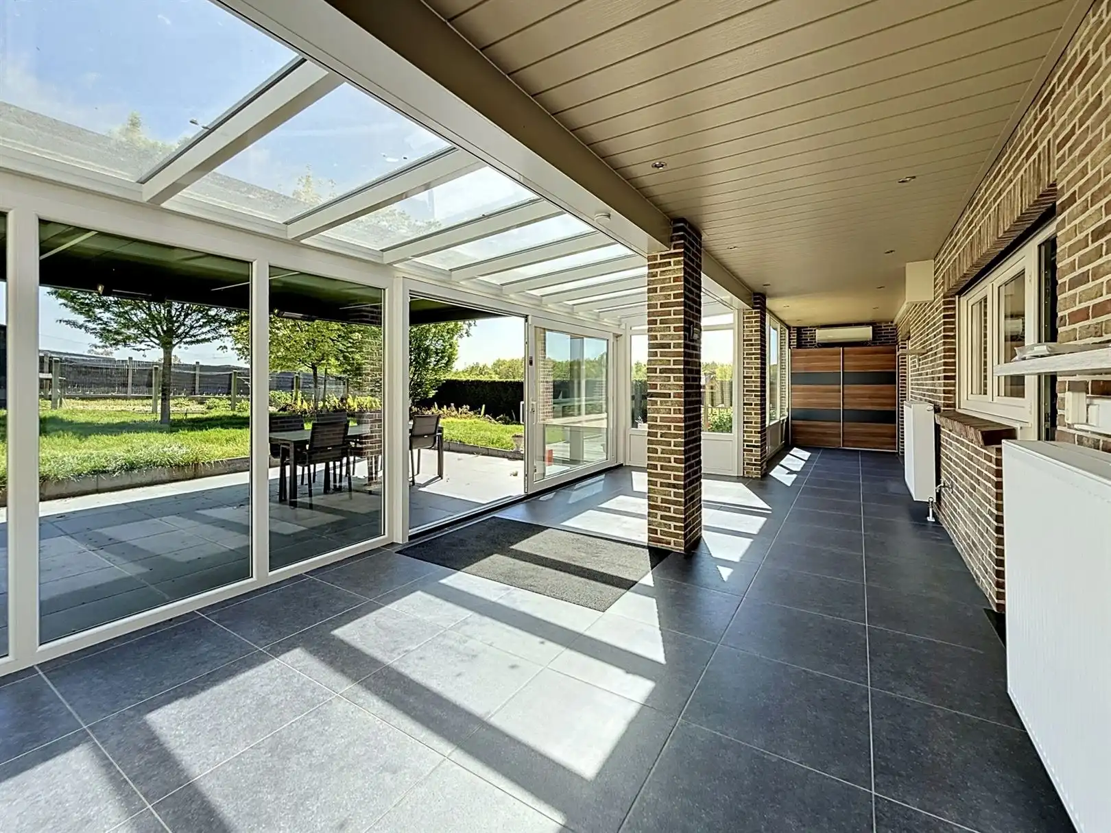 Ruime open bebouwing met 4 slpks, veranda, tuin, garage, 8a  foto 16