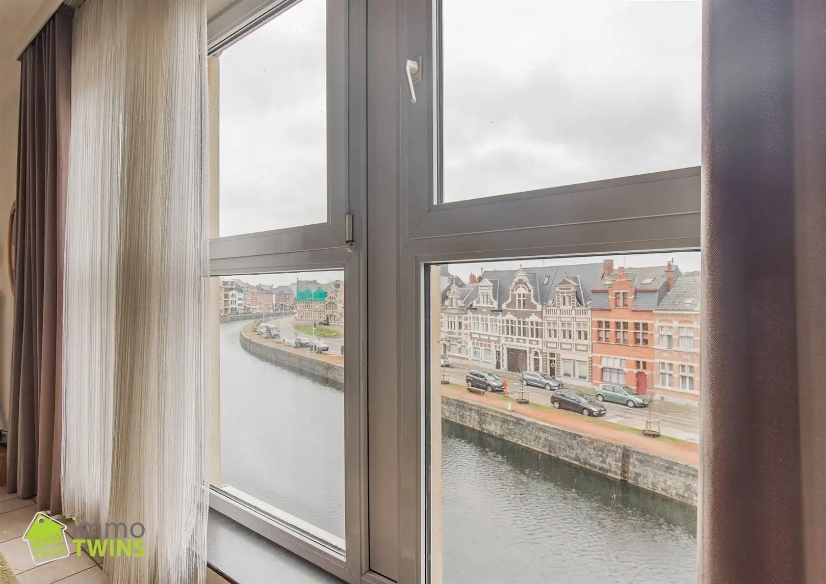 Uniek appartement met terras en adembenemend panoramisch zicht op de Oude Dender foto 4