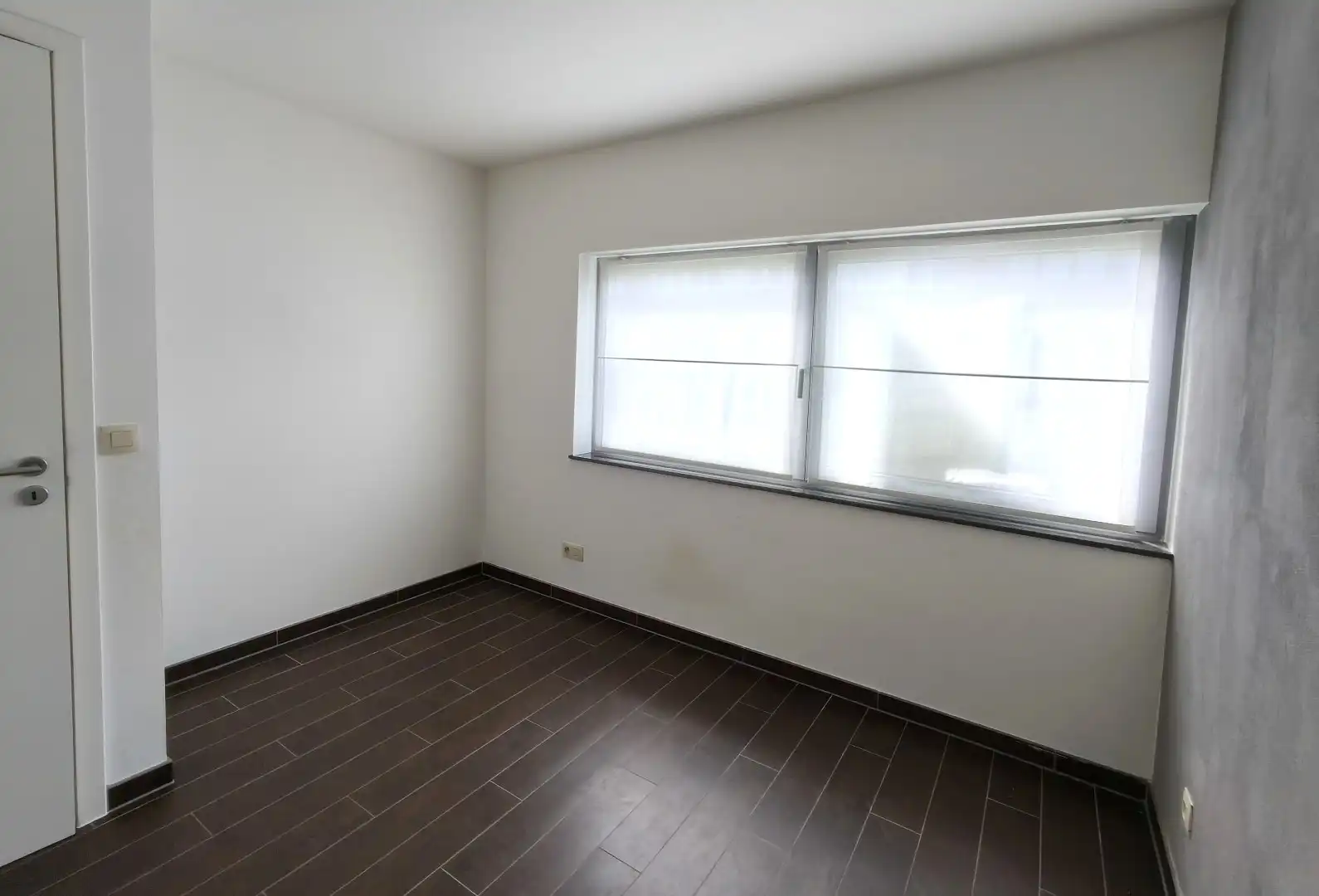 GELIJKVLOERS APPARTEMENT MET RUIM ZONNETERRAS EN GARAGE foto 12