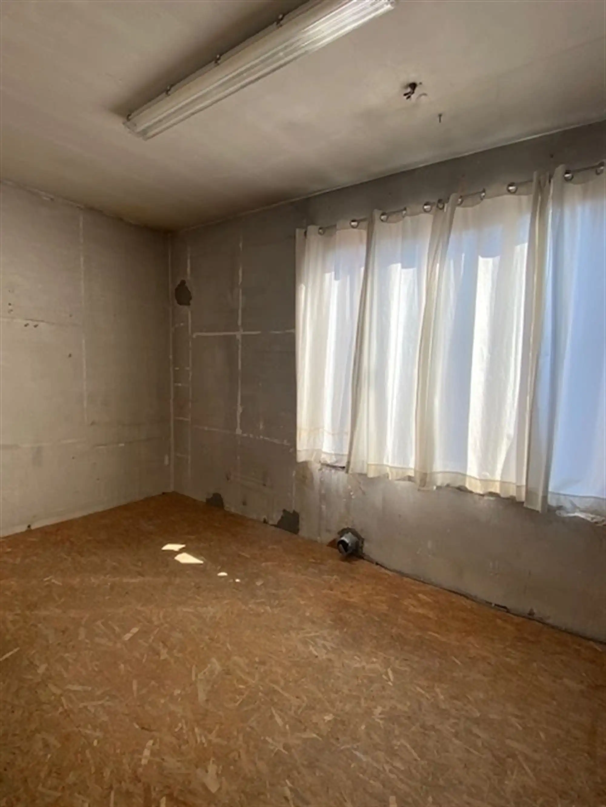 Karaktervol handelshuis met woonst foto 11