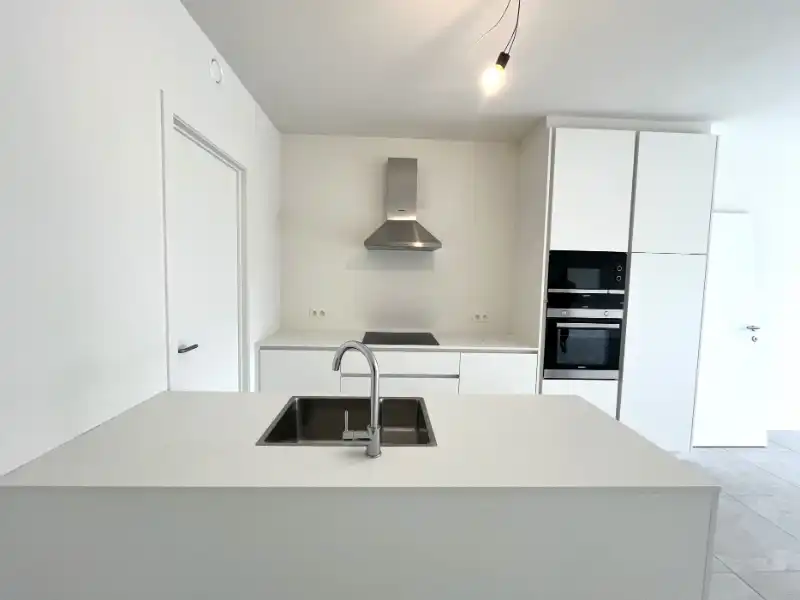 Energiezuinig 2 slpkm appartement met terras, tuin en staanplaats foto 8
