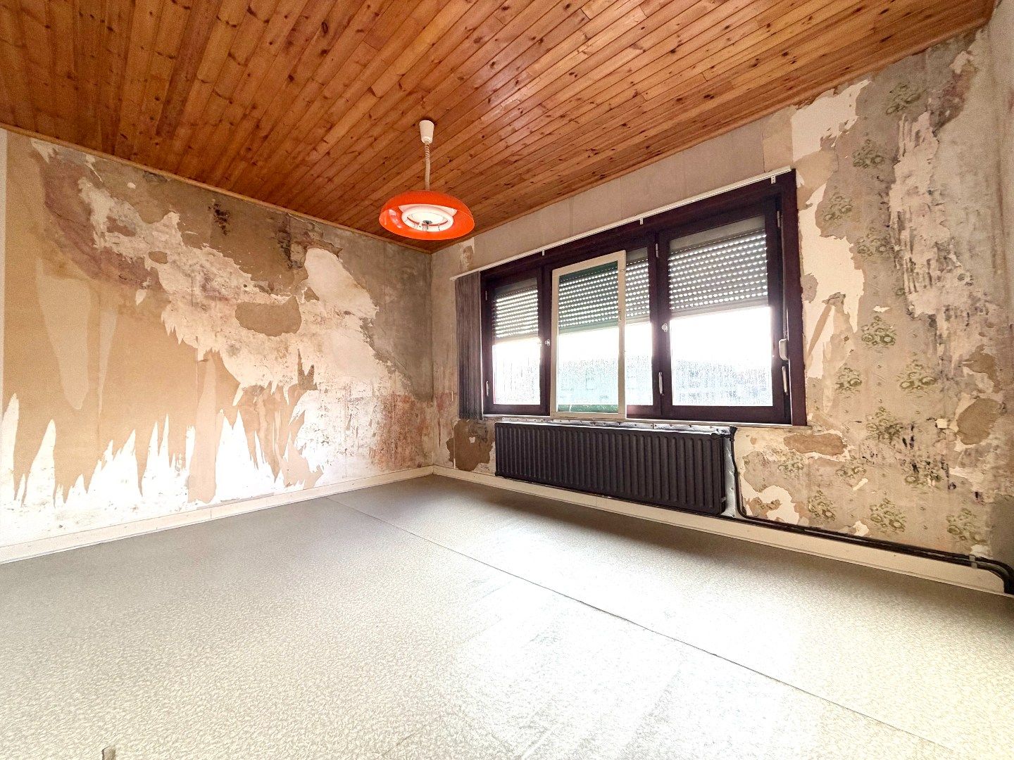 Te renoveren rijwoning met 4 slaapkamers en tuin in Kortrijk foto 13