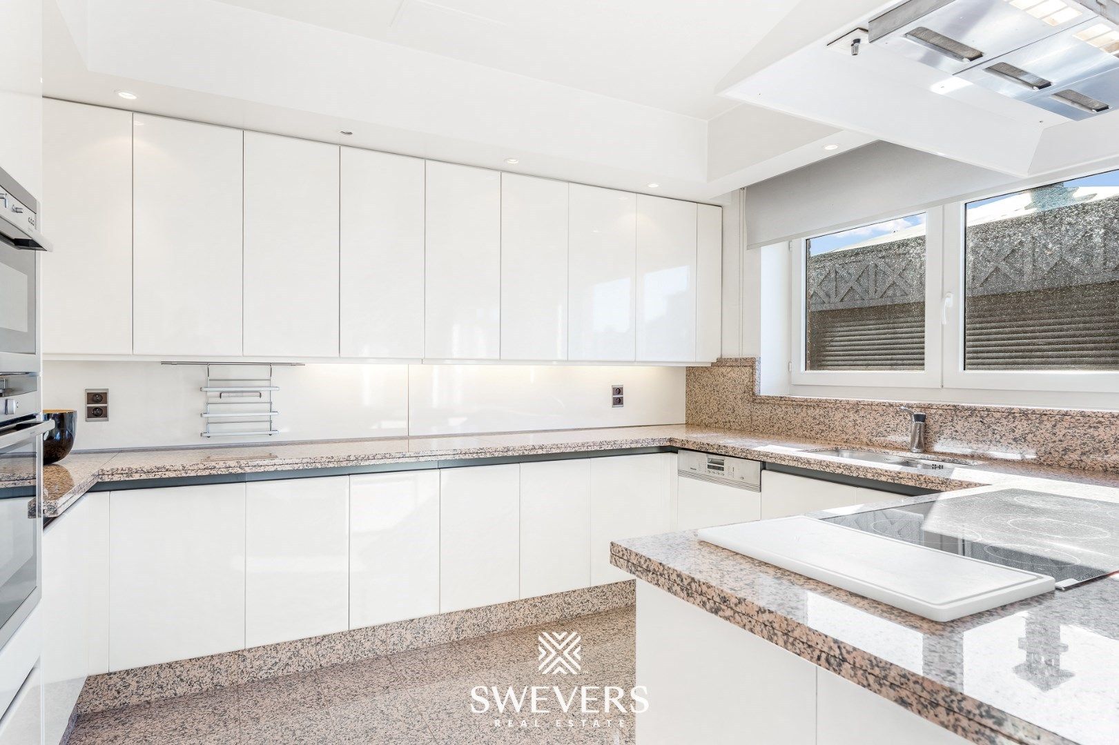 Handelspand met ruime woning in hartje Lummen – een unieke opportuniteit foto 9