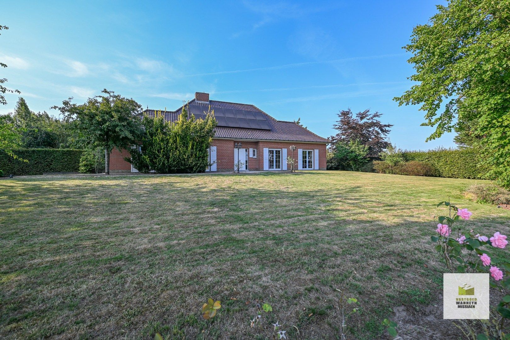 Villa met weide 3.500 m2 en akkerland van 1,4 Ha mét vergunning voor een nieuwe loods van 300 m2  foto 4