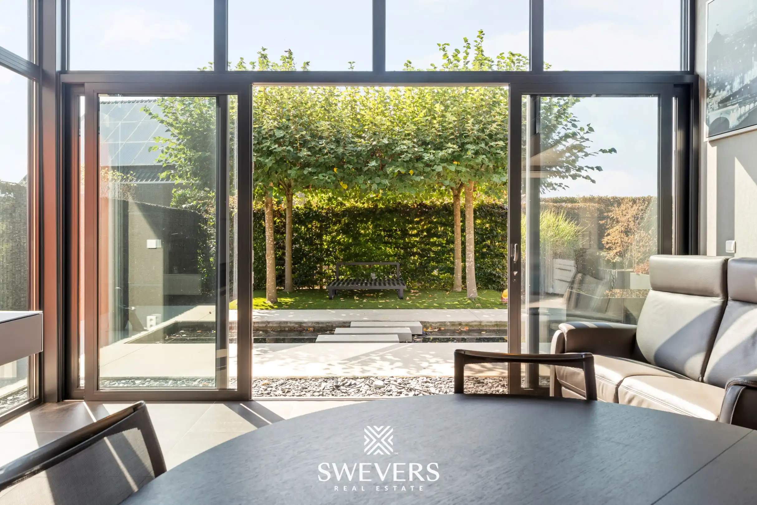 Instapklare woning met prachtig aangelegde tuin en overdekt terras foto 4