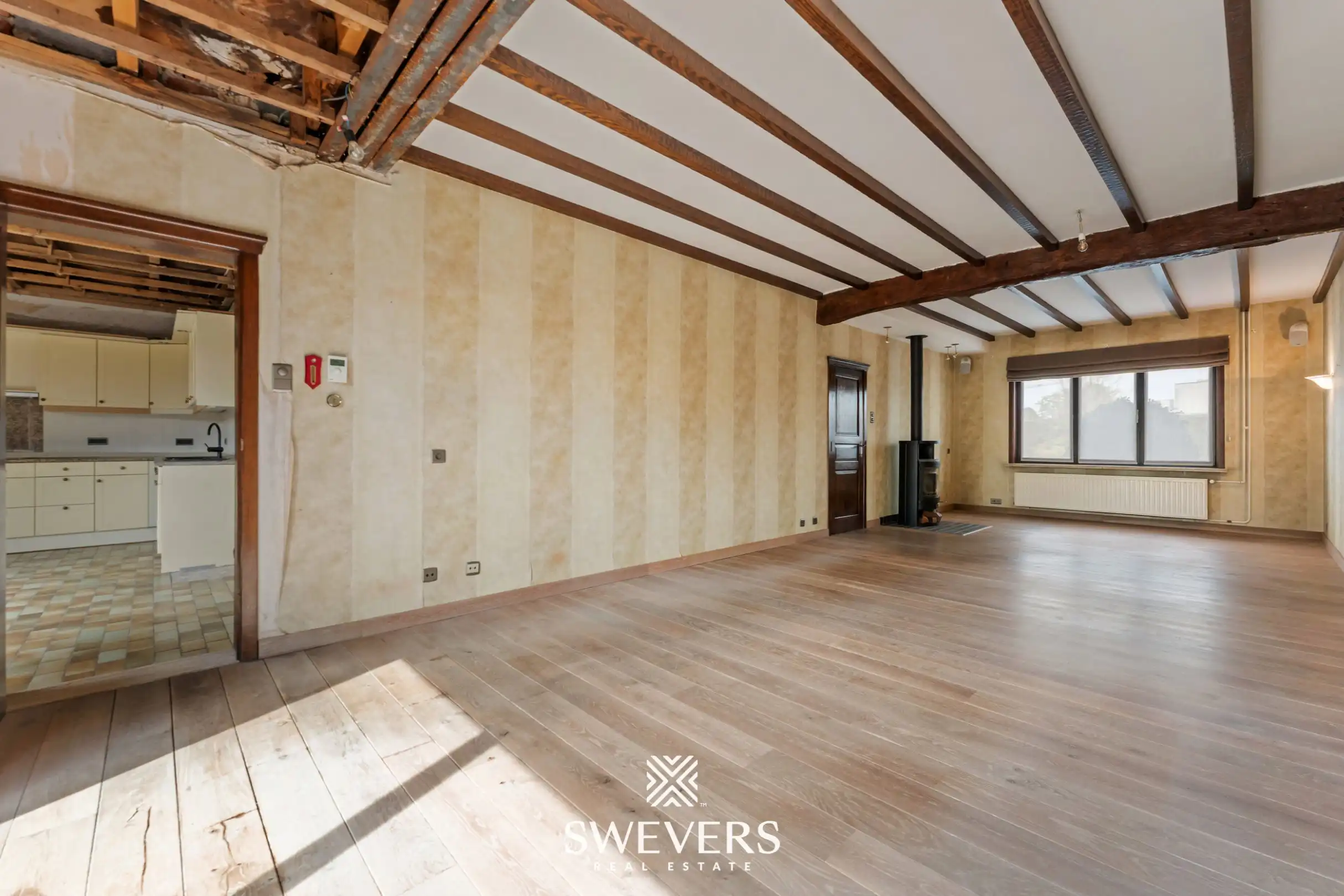 Verrassend ruime woning tot 5 à 6 slaapkamers in het centrum van Zonhoven foto 4