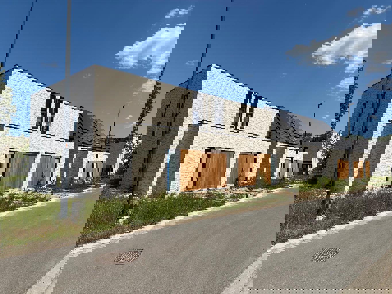 immo DAVID stelt voor: 14 nieuwbouwwoningen te Opwijk foto {{pictureIndex}}