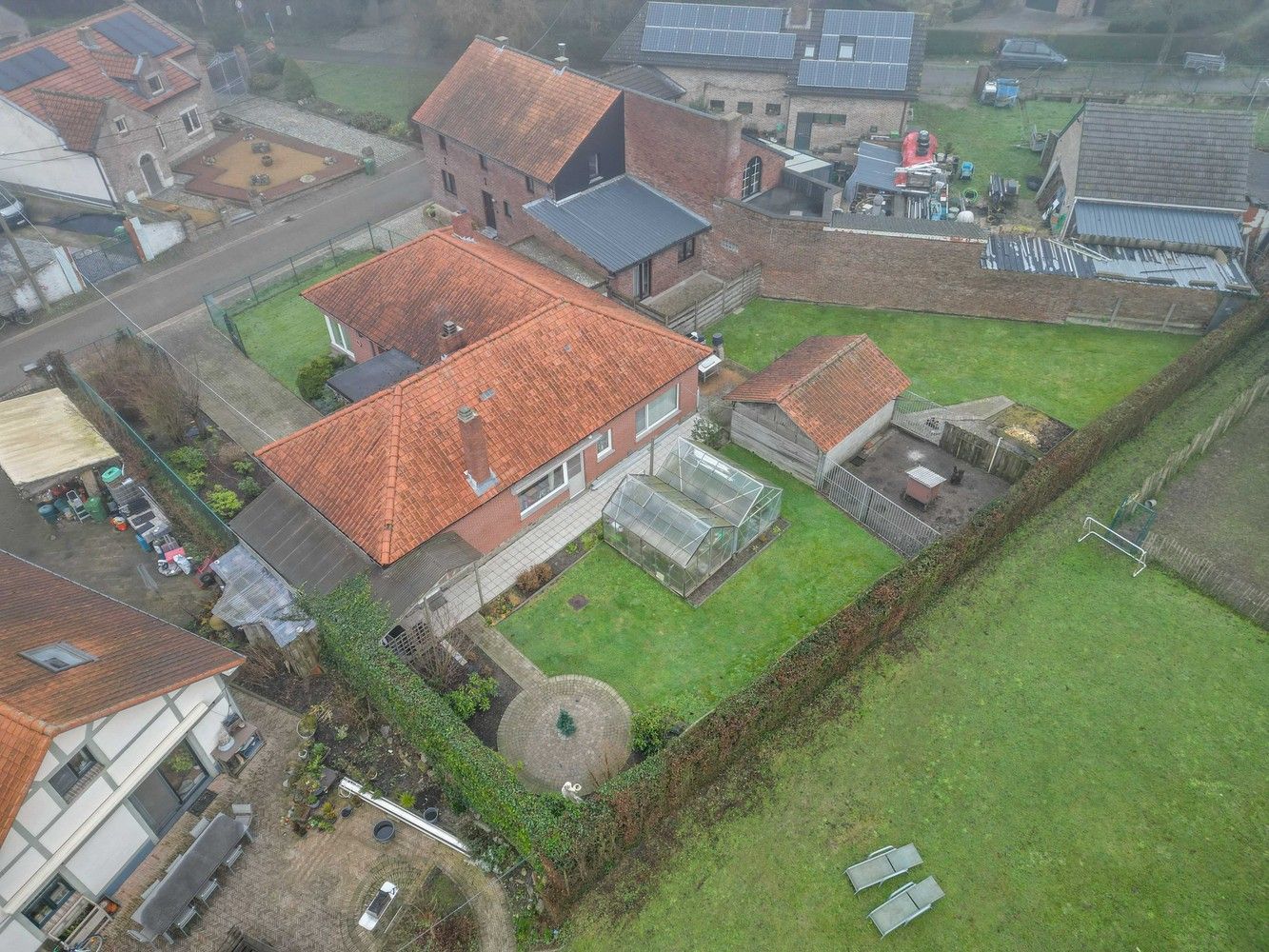 Bungalow met vier slaapkamers, inpandige garage en ruime tuin te koop in Kortessem foto 13