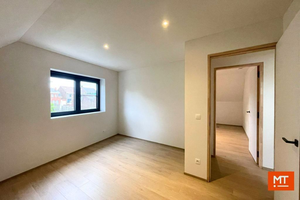 Kwalitatieve nieuwbouwwoning te huur op een rustige locatie in het centrum van Passendale foto 16