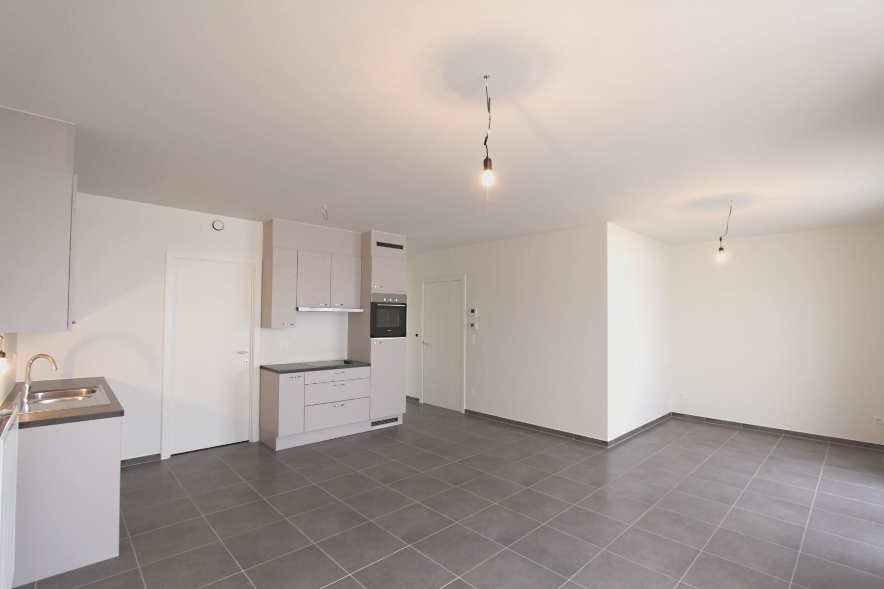 Knap, centraal gelegen nieuwbouwappartement foto 2