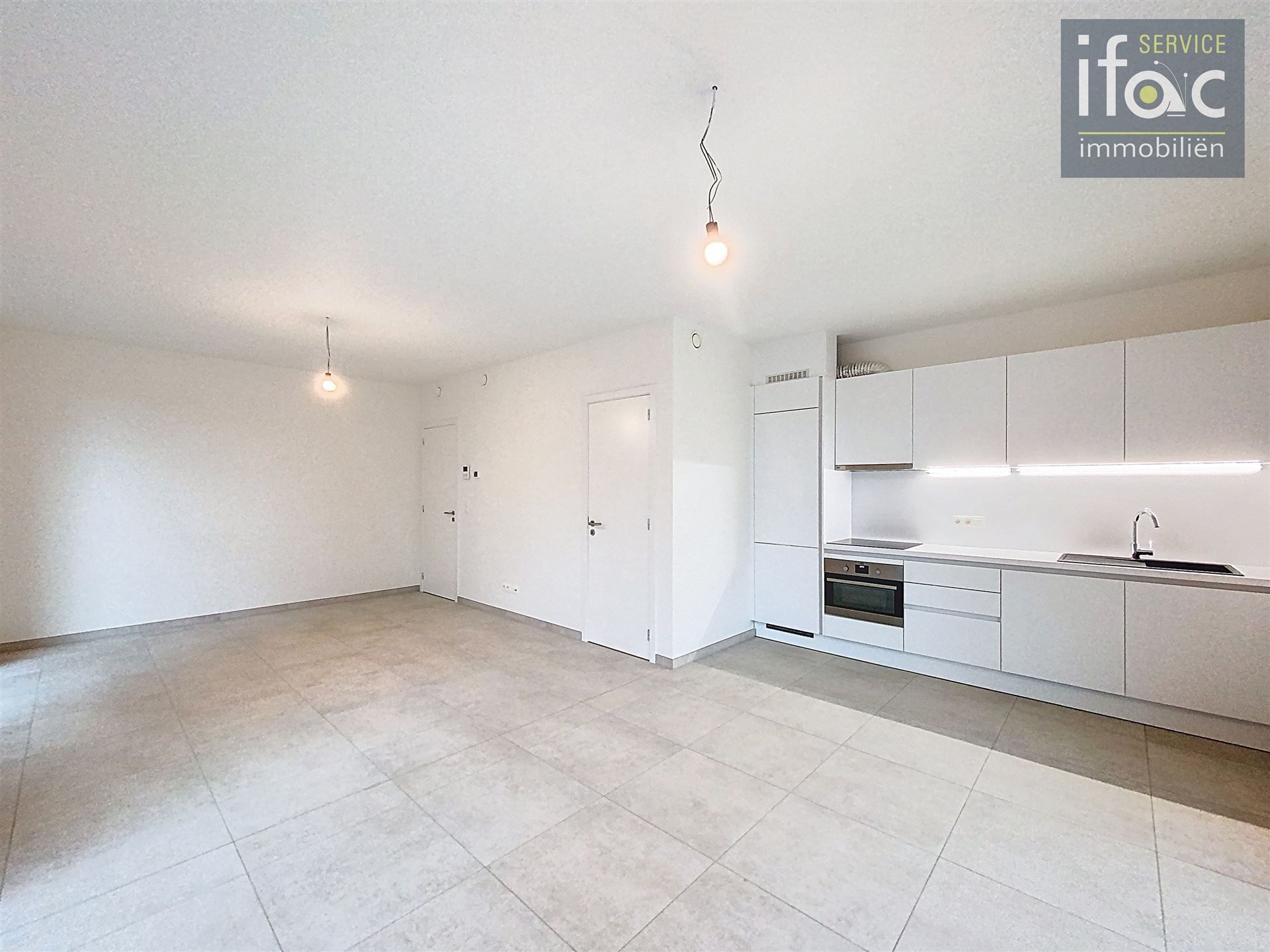 Nieuwbouw appartement met terras en ondergrondse staanplaats foto 2