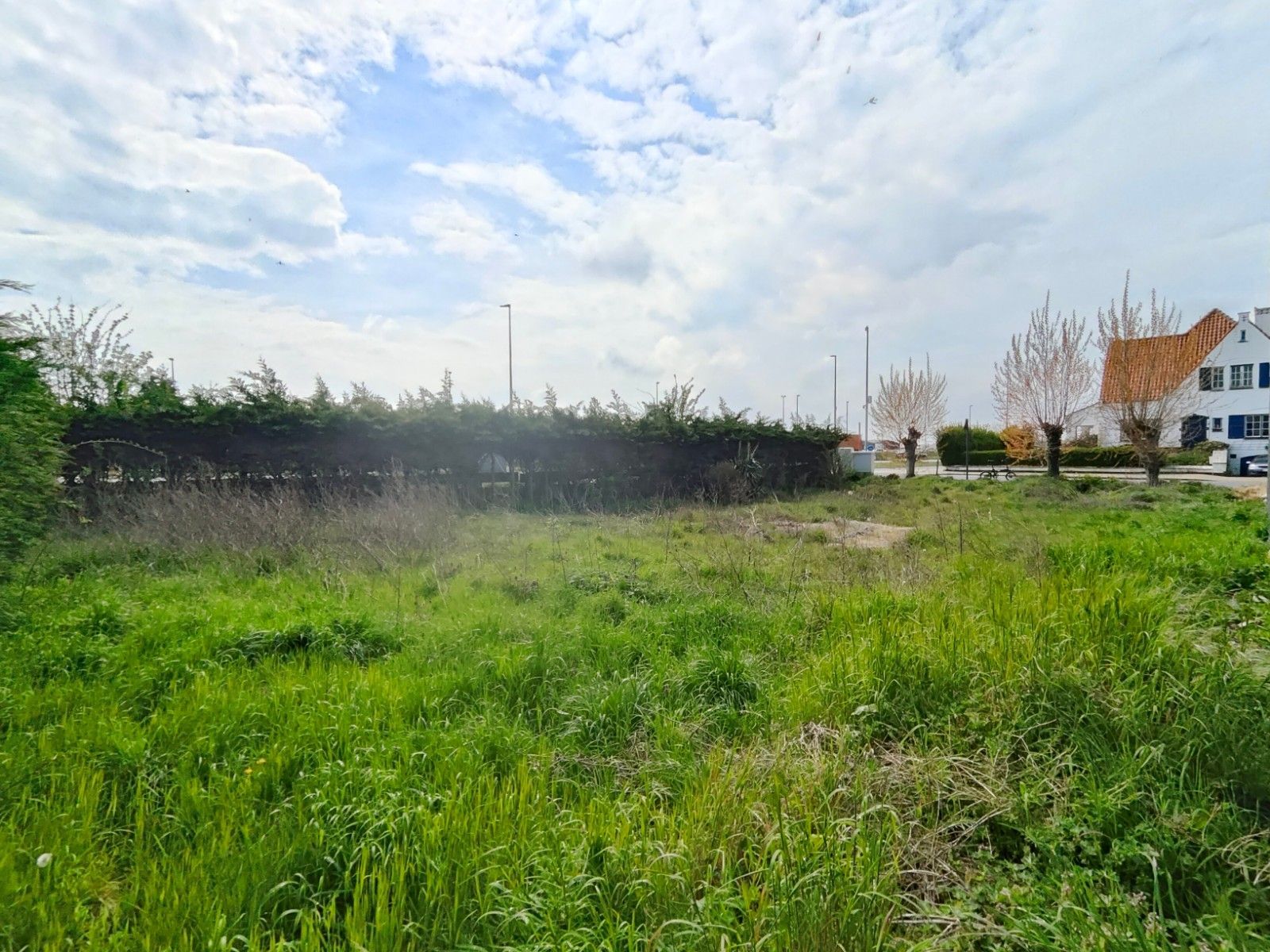 Wonen tussen land, duinen en zee? Uniek zuidgeoriënteerde  bouwgrond op topligging te Oostende ! foto {{pictureIndex}}