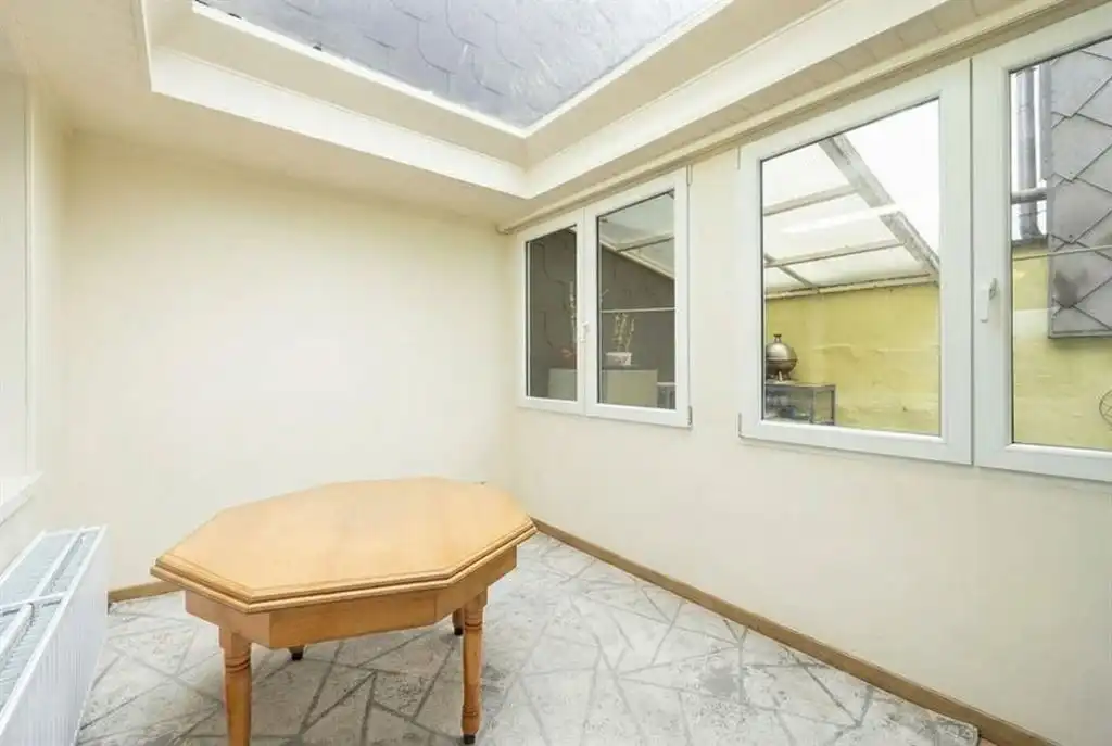 Gezellige woning met ruime garage en stadskoer foto 5