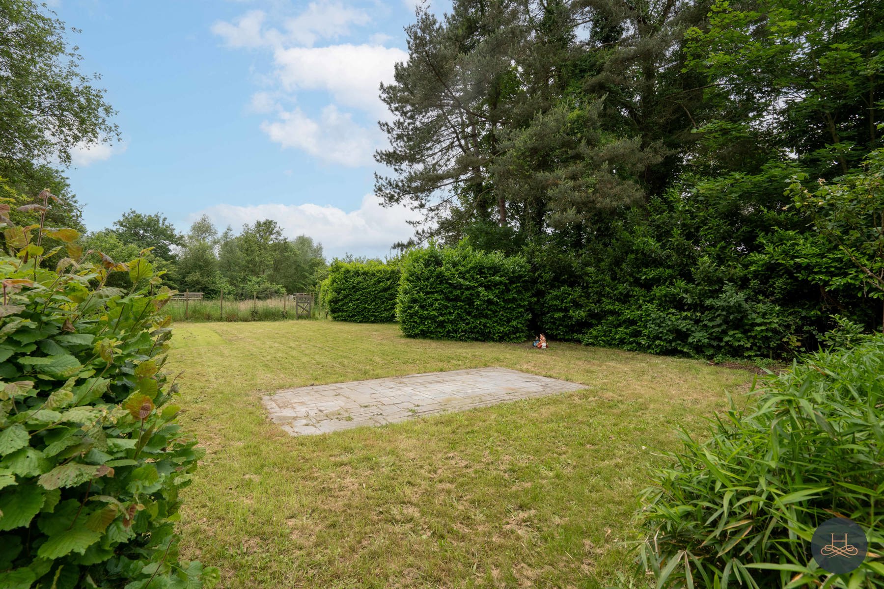 Achterliggende gezinswoning op rustgevend perceel foto 20