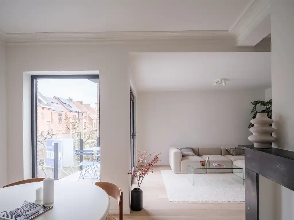 Stijlvol gerenoveerd 2-slaapkamerappartement met meerdere terrassen in het centrum van Gent foto {{pictureIndex}}