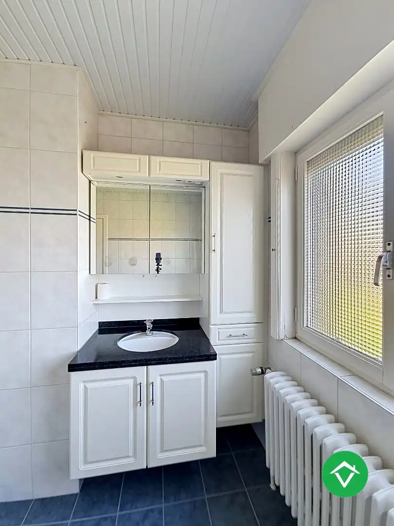 Gezinswoning met polyvalente ruimte, vijf slaapkamers en inpandige garage te Koekelare foto 11