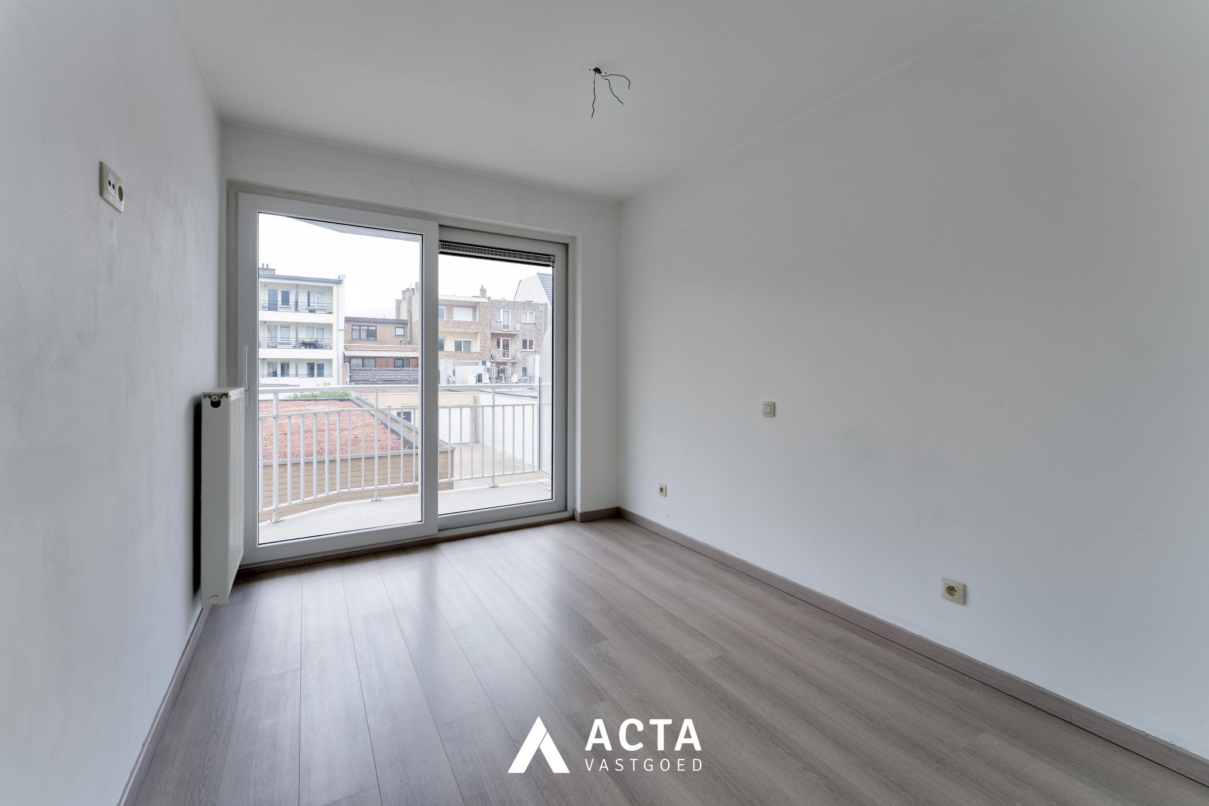 Nieuwbouwappartement met twee slaapkamers en terras in Mariakerke foto 7