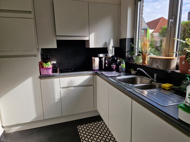 Prachtig gelijkvloersappartement met 2 slaapkamers,  tuin en garage foto 5