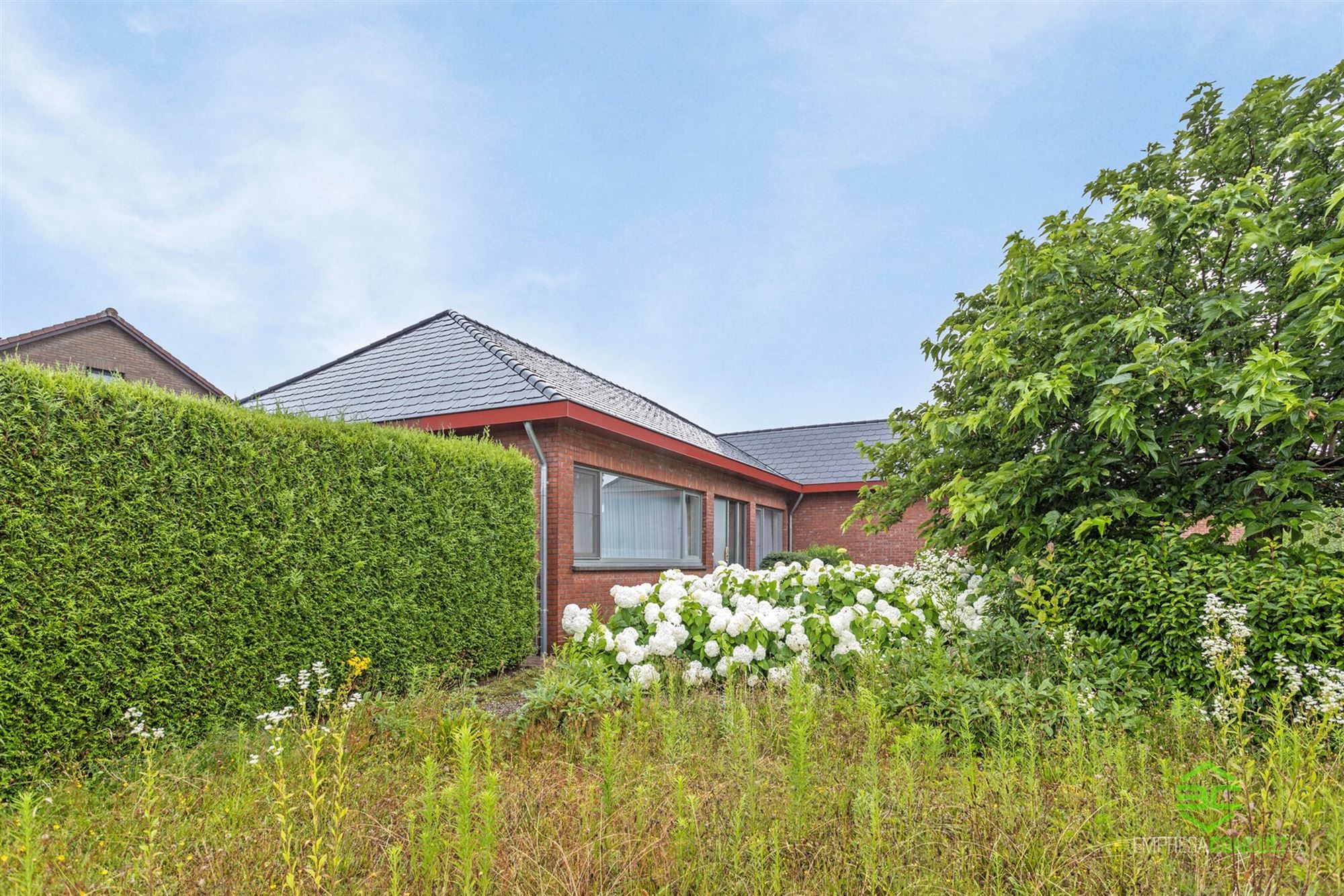 Gelijkvloerse woning met 2 slpk in Kermt! foto 3