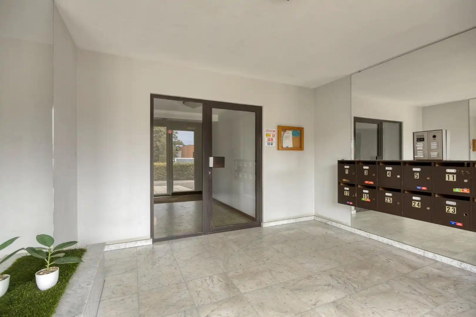 1-slaapkamerappartement met terras en private kelderberging in Linden! - EPC 133 kWh/m² - bewoonbare opp. 69m² foto 2