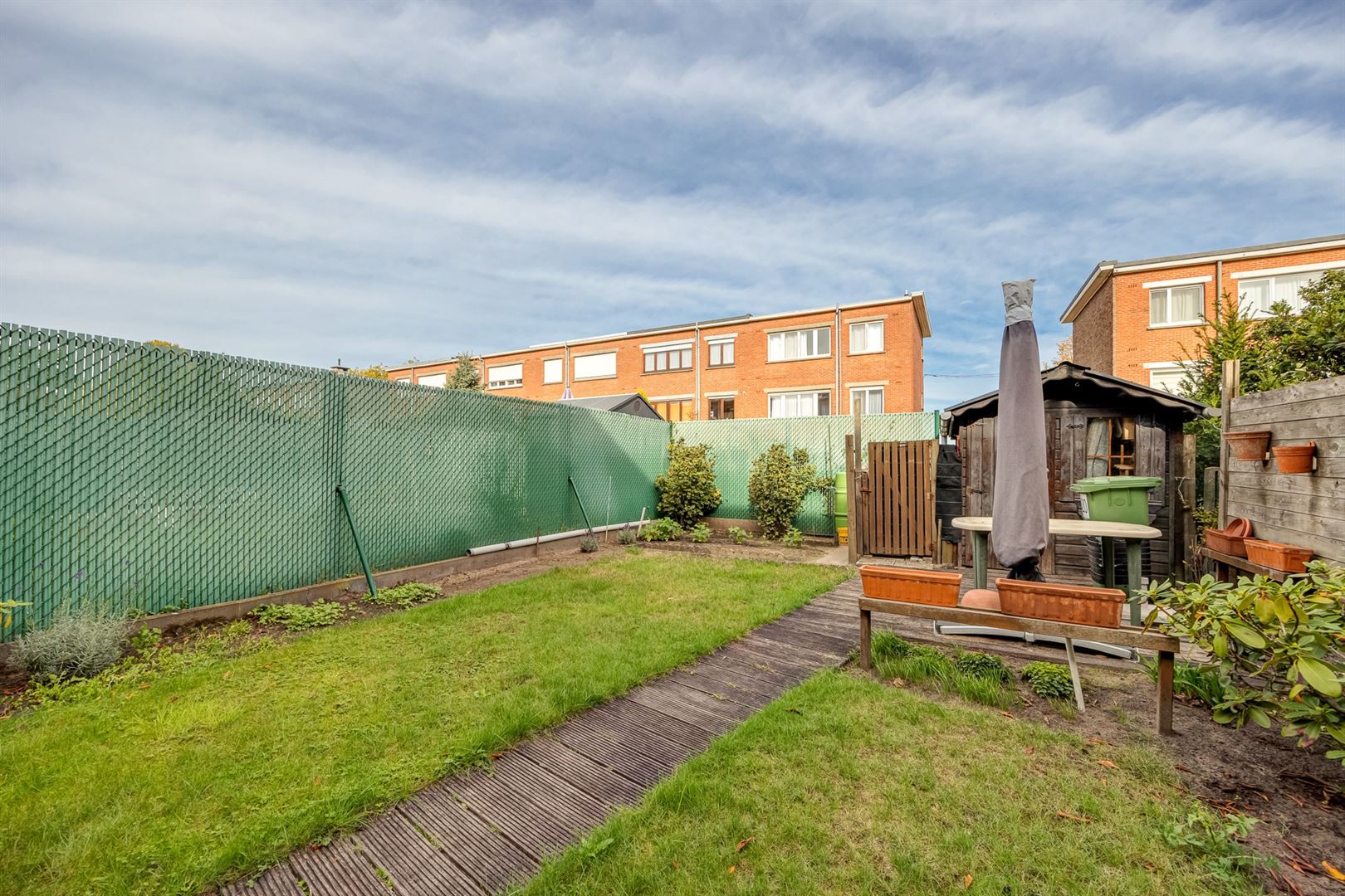 Een praktisch huis met tuin in een kindvriendelijke buurt foto 7