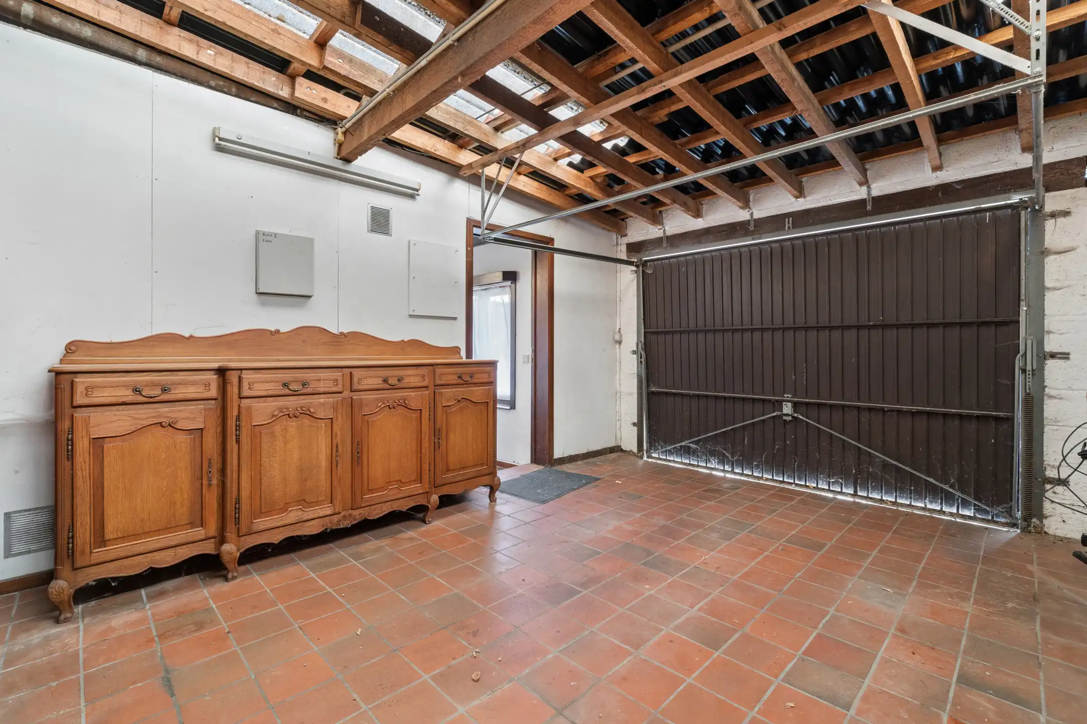 Charmante 3-gevelwoning met garage en tuin foto 24