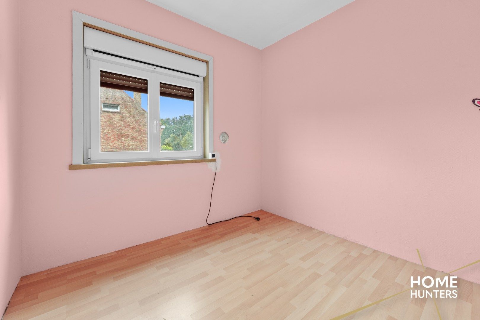 Ruime hoekwoning met potentieel te Roeselare! foto 8