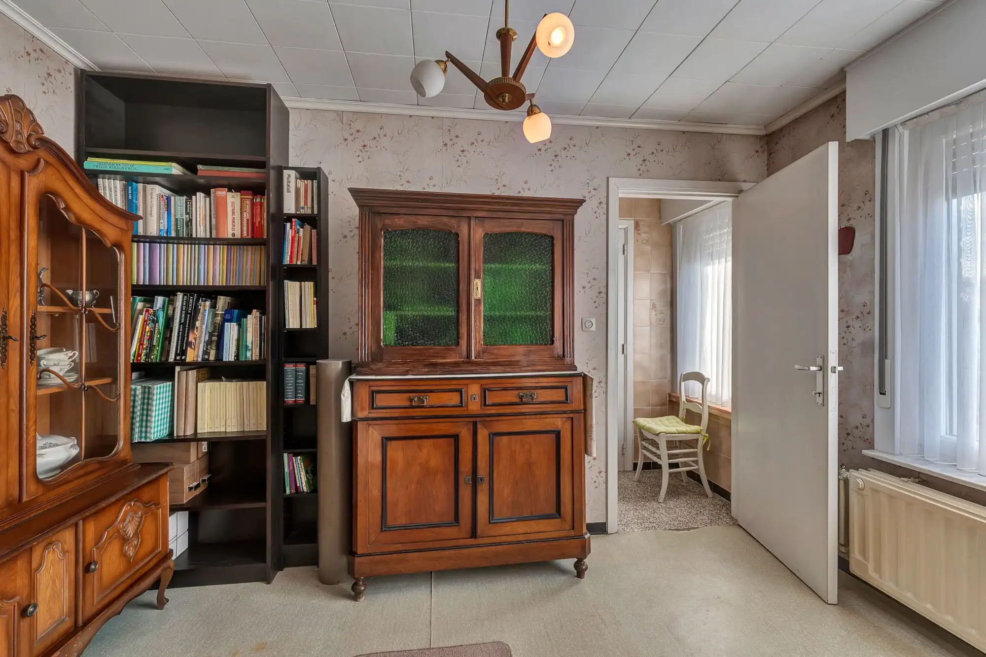 Te renoveren halfopen woning met garage en grote tuin foto 7