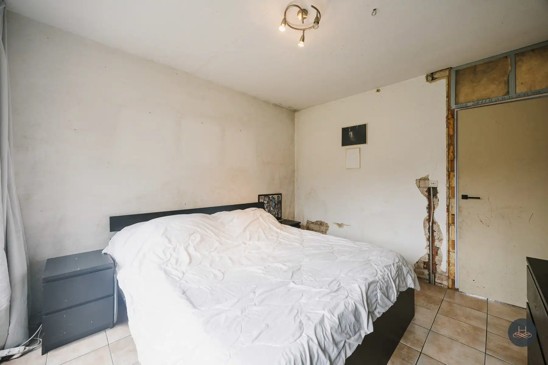 Gezinswoning met renovatiepotentieel op knap perceel foto 18