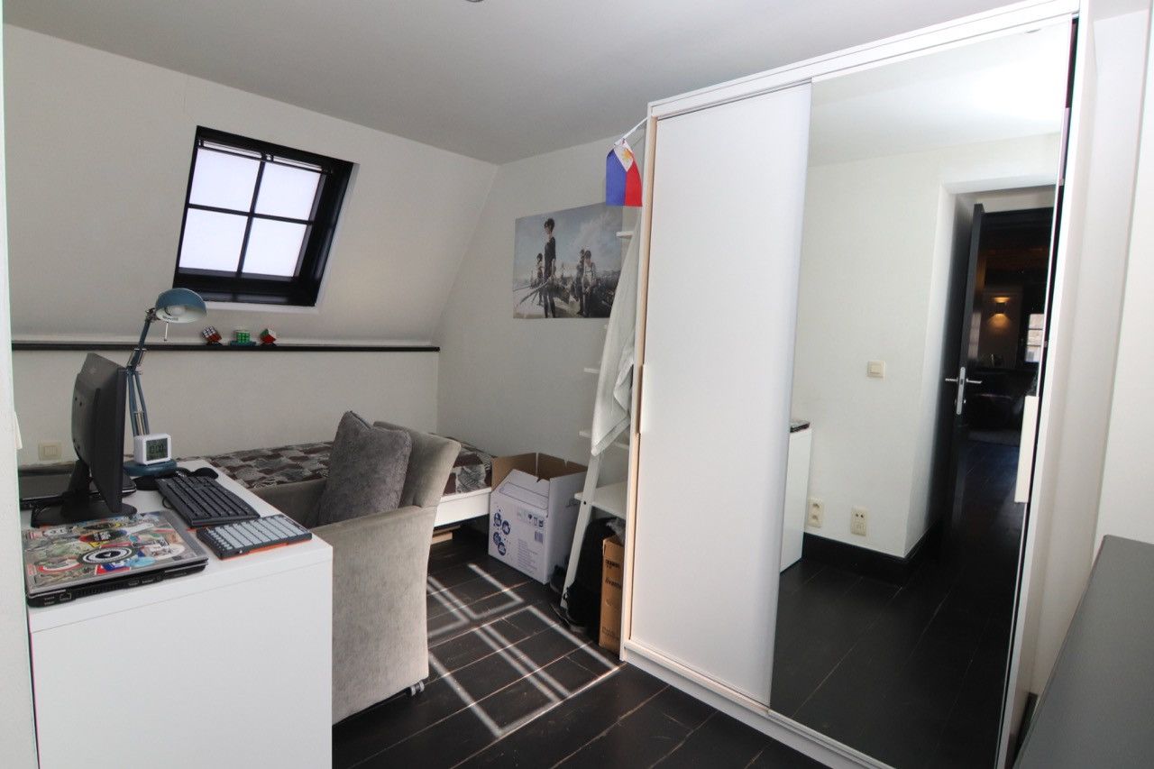 Duplex met tof terras in authentiek gebouw foto 11