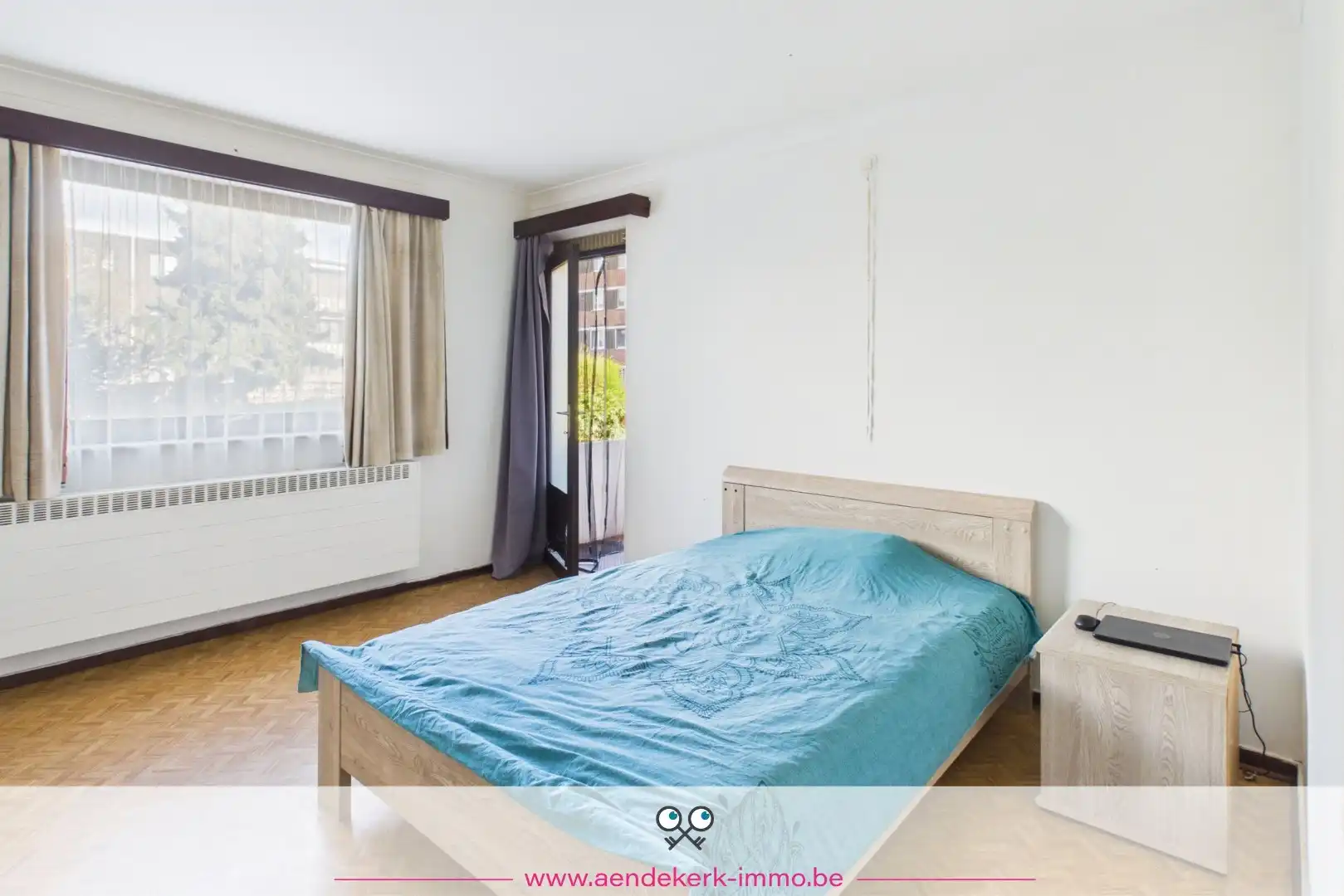 Ruim gelijkvloers appartement met 3 slaapkamers, garage en kelderberging foto 14