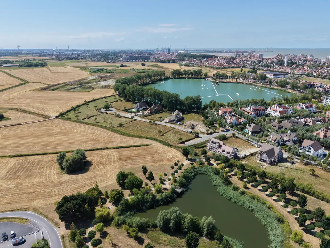GOLFLOT:   bouwperceel met open zicht rechtstreeks op toekomstige golf van Duinenwater.  foto 6