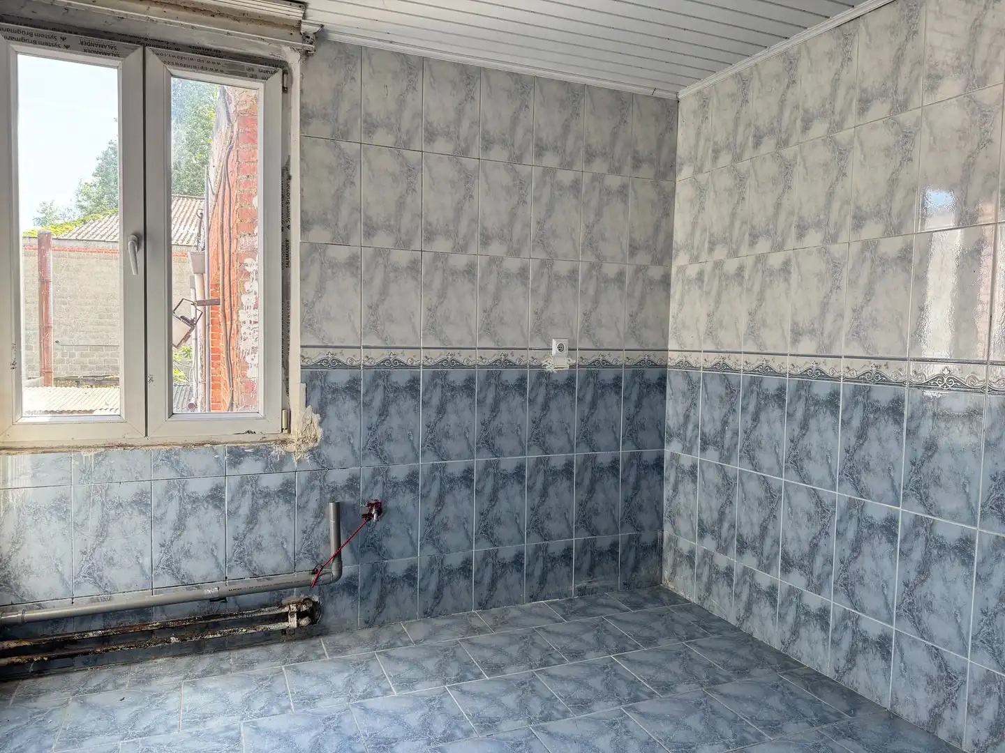 Ruime renovatiewoning met garage en koer te Temse. foto 14