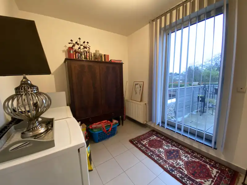 Verzorgd appartement met terras, parkeerplaats en private berging – interessante opbrengsteigendom foto 6