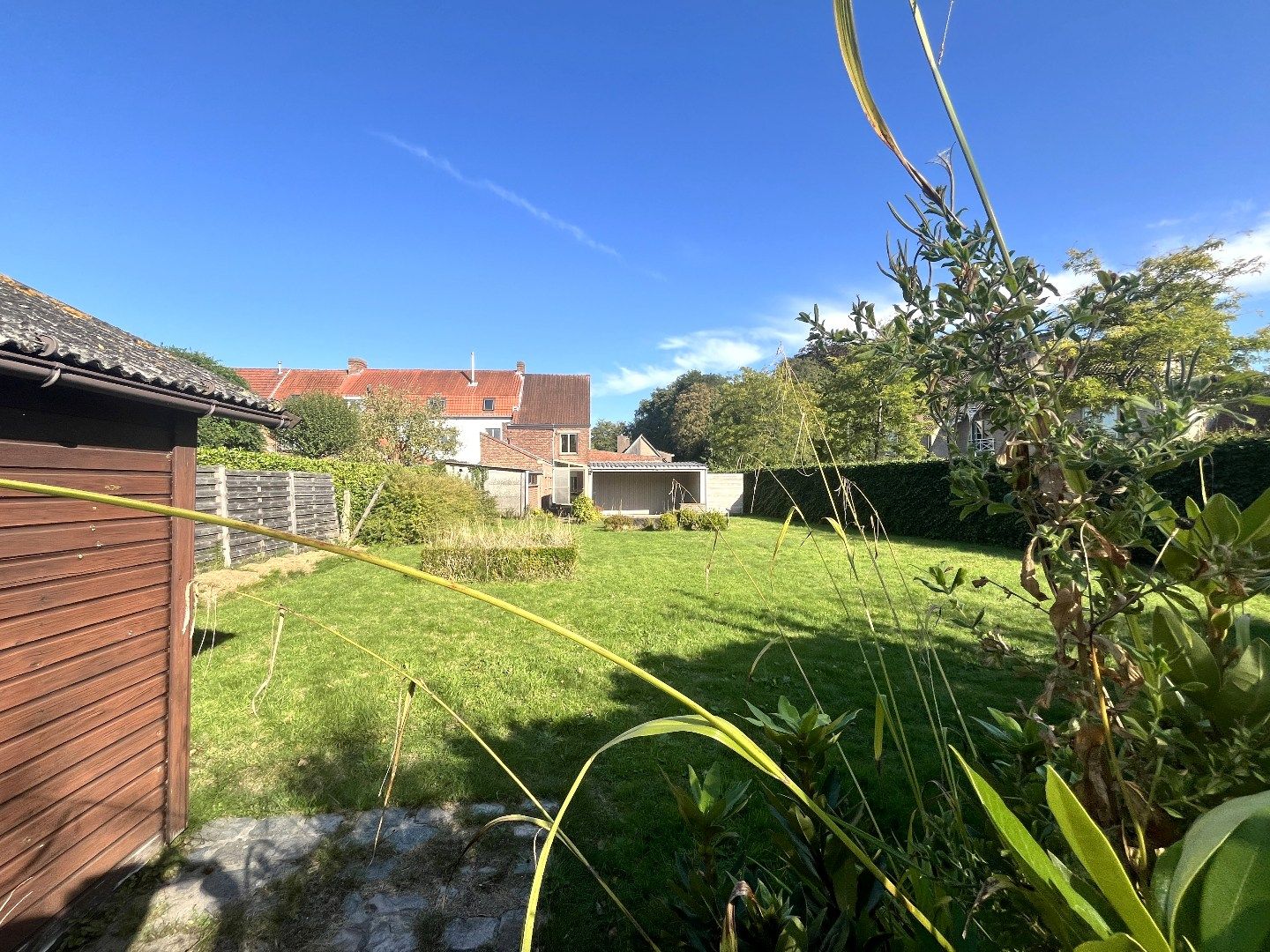 Halfopen 4-slpkr woning met tuin & garage foto 8