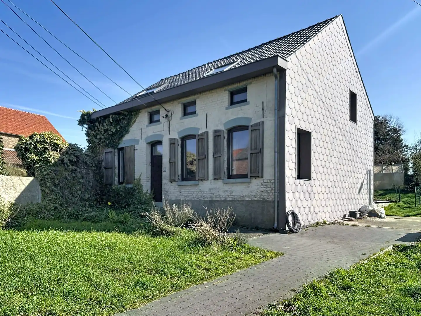 Ruime open bebouwing met zonnige tuin in Hoegaarden foto 2