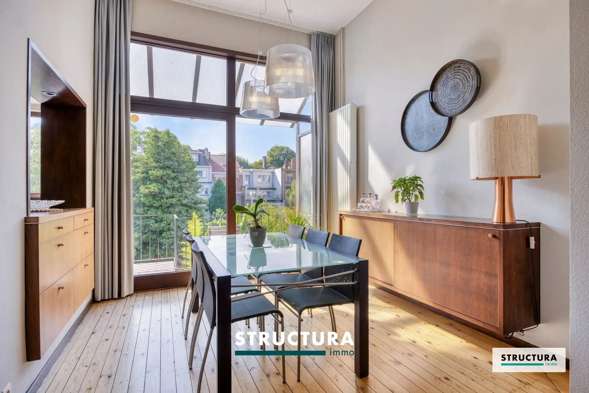 Ruime en lichtrijke woning met een aangename zuidgerichte tuin. foto 4