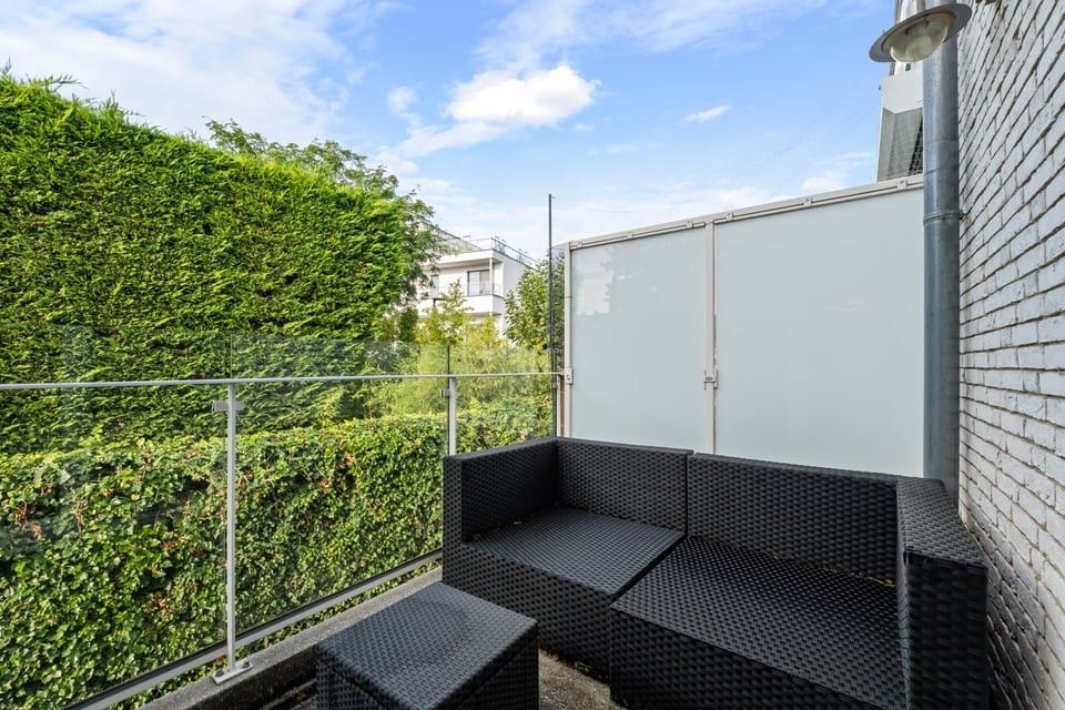 KNAP APPARTEMENT MET 1 SLAAPKAMER EN STAANPLAATS IN SINT-TRUIDEN foto 20