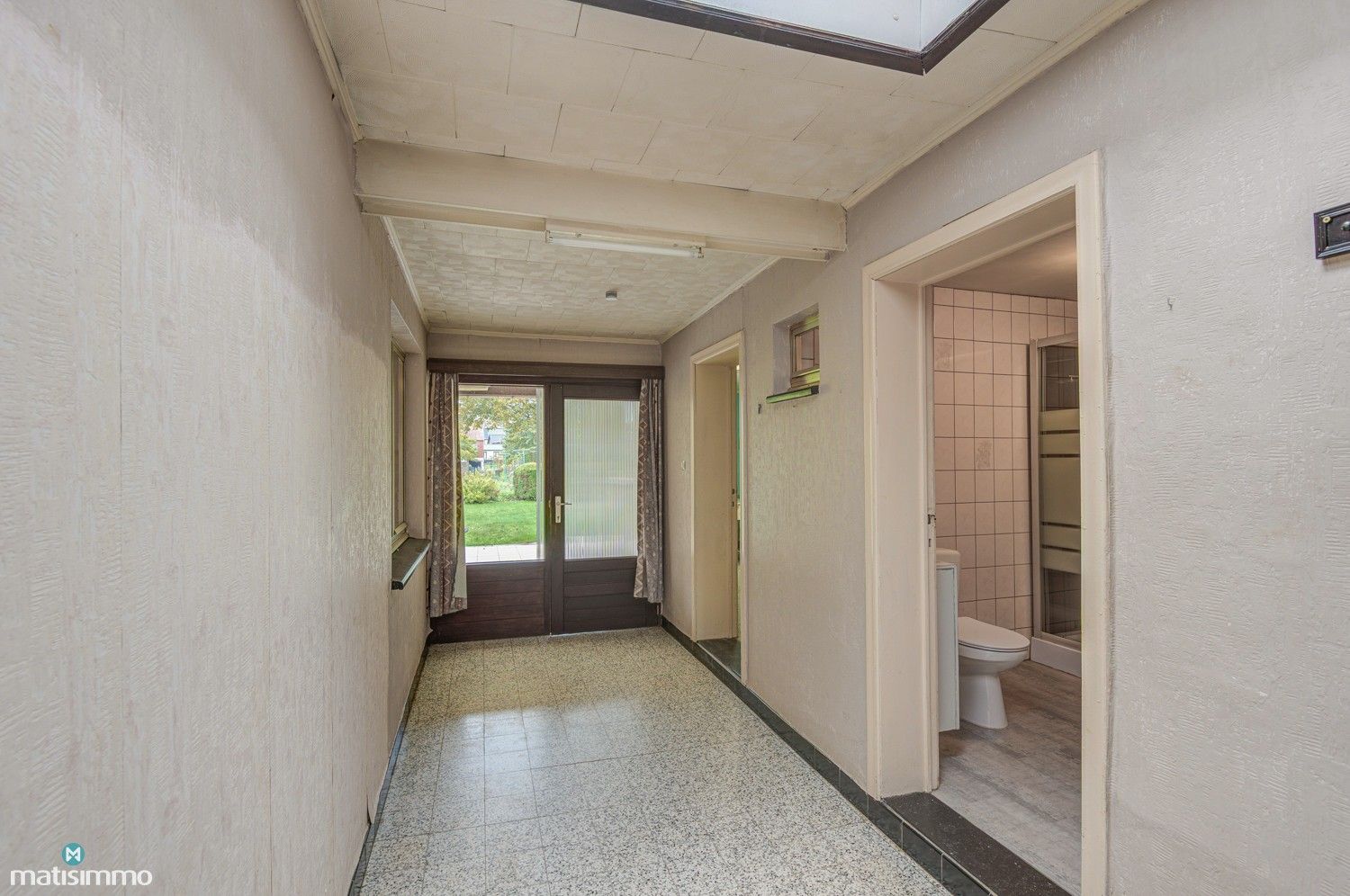 GEZINSWONING MET RUIME TUIN EN DRIE SLAAPKAMERS IN MARTENSLINDE foto 13