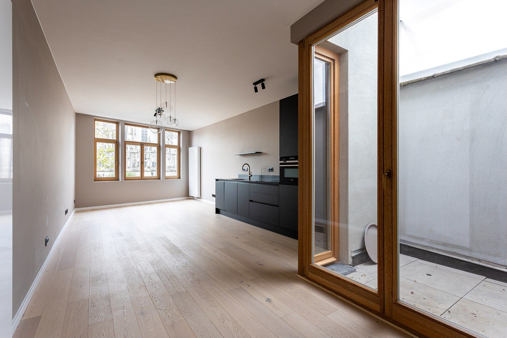 Prachtig gerenoveerd appartement (71m²) met dakterras (40m²)! foto 4