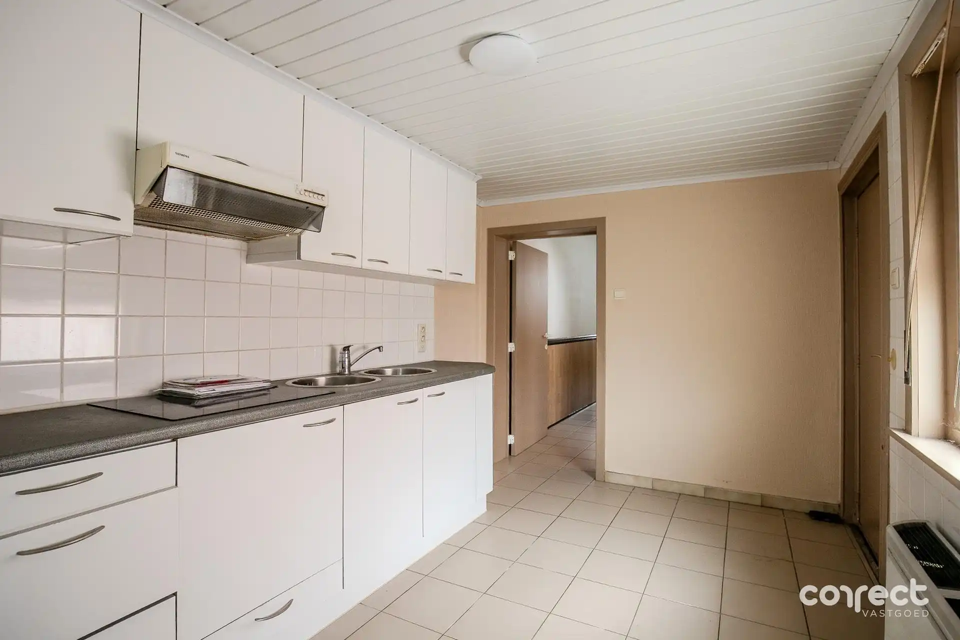 Rustig gelegen woning met 3 slaapkamers, ruime zolder en tuin. foto 4