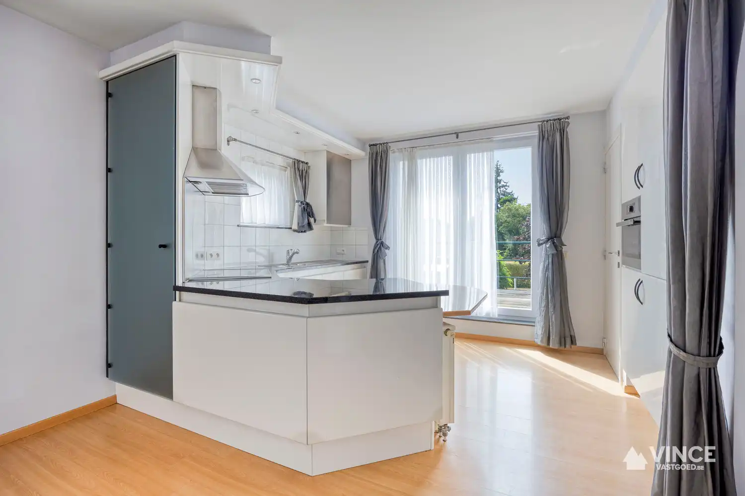 Duplex appartement met zonnig terras en garage foto 4