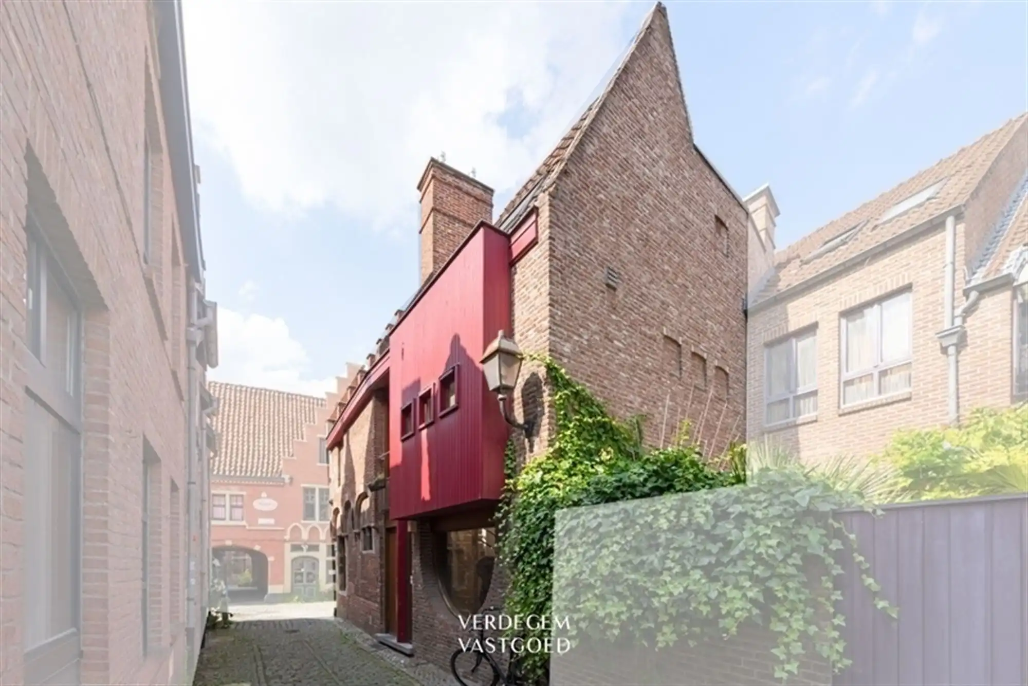 Prachtig historisch pand met handelsruimte en woonst in Patershol foto 2