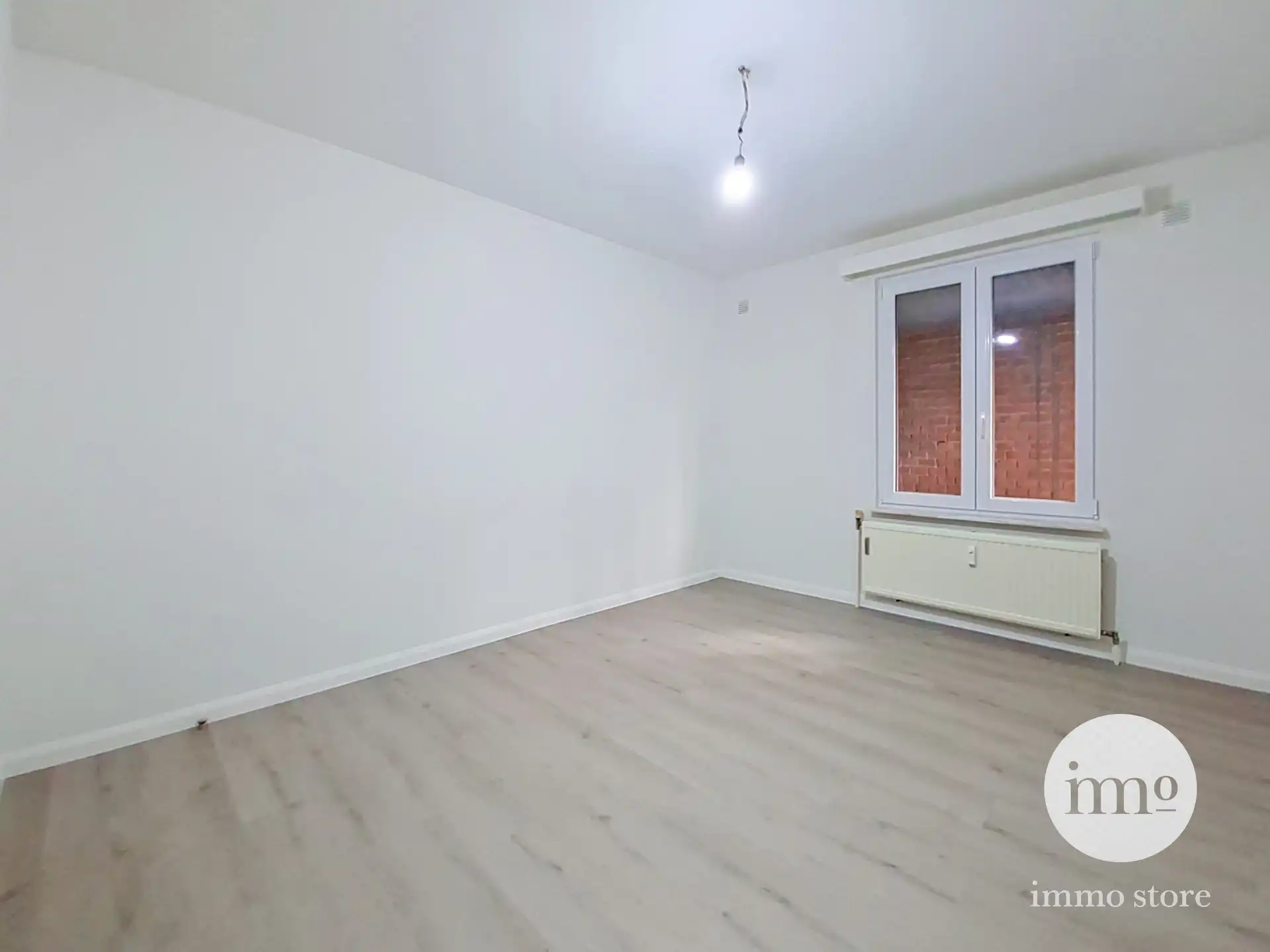 Lichtrijk gerenoveerd 3-slaapkamerappartement foto 13